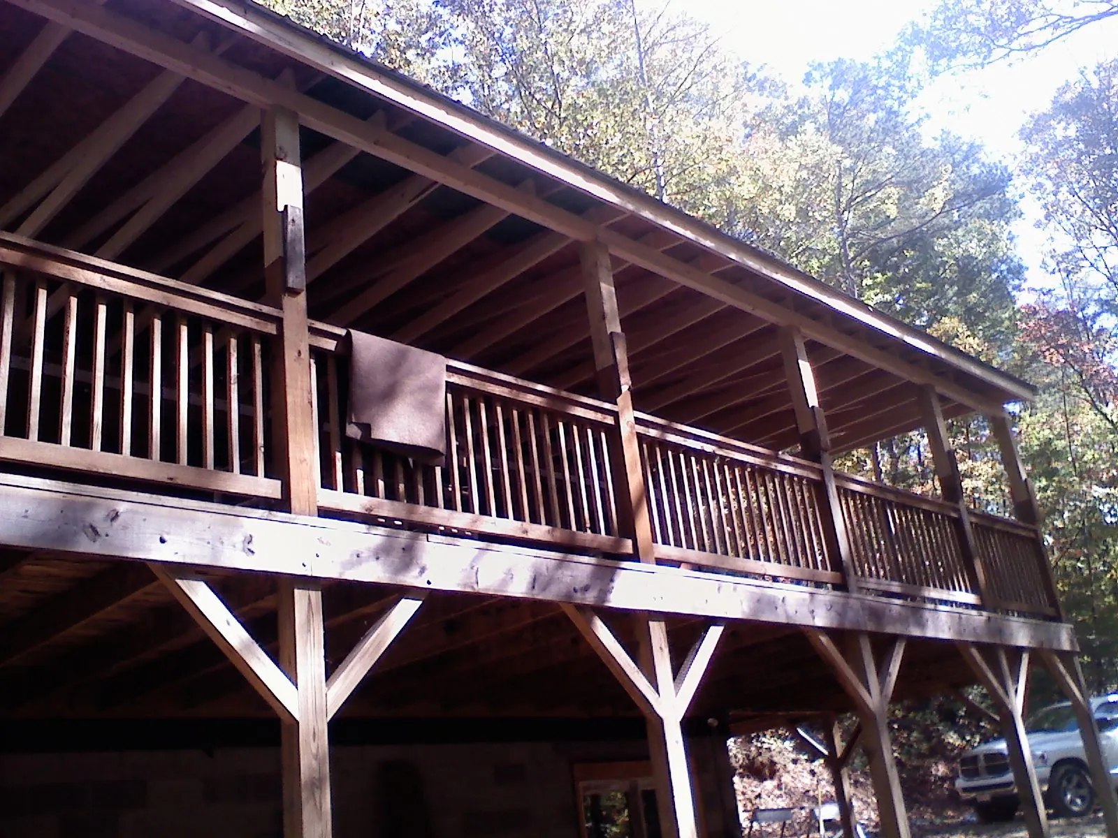 Timber framing under a new elevated porch and deck — Roof Leak Repair in Granbury by Roofing Brothers